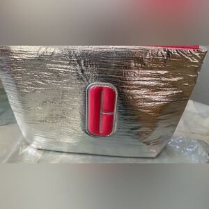 Clinique Silver and Pink logo (bag only )